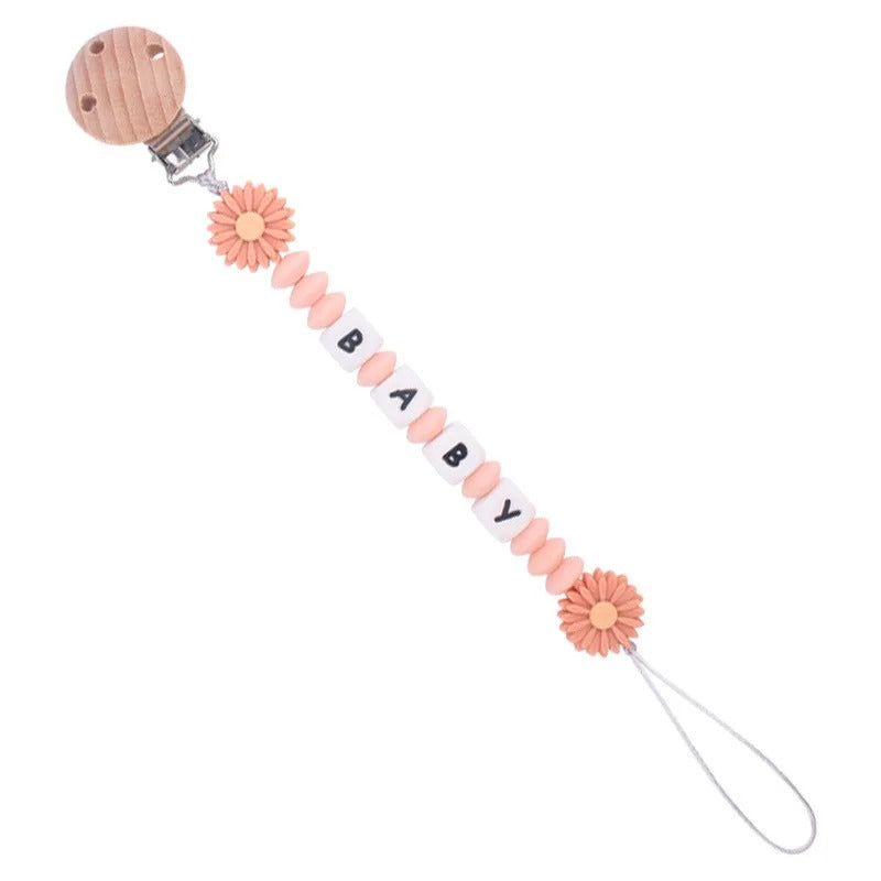 Attache tetine elegant et doux rose