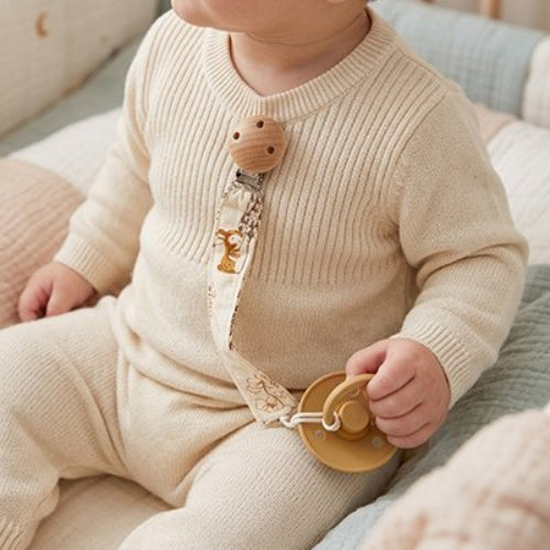 Attache tetine evolutif bebe assis