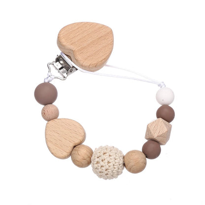 Attache tetine securisee et coloree beige