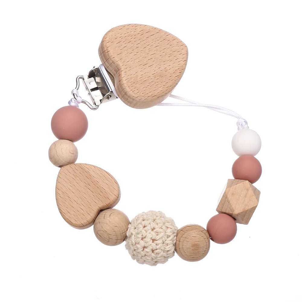 Attache tetine securisee et coloree rose fonce