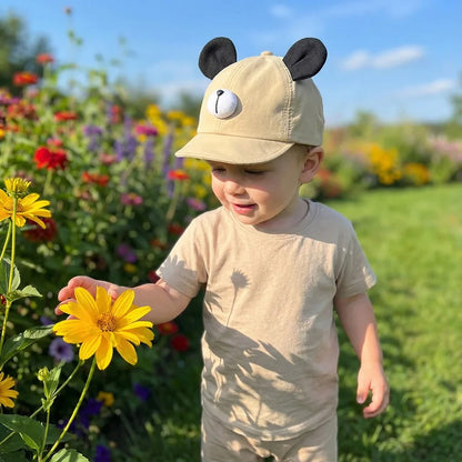 Casquette bebe douceur et confort bebe touche une fleur