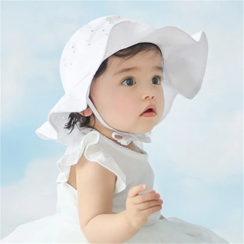 Chapeau bebe fleuri large bord bebe est protege