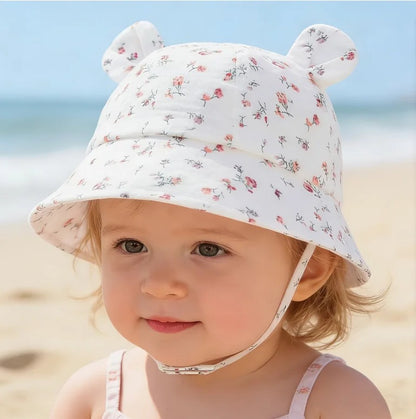 Chapeau bebe respirant bebe a la plage