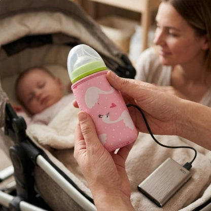 Chauffe biberon nomade portable bebe est dans sa poussette