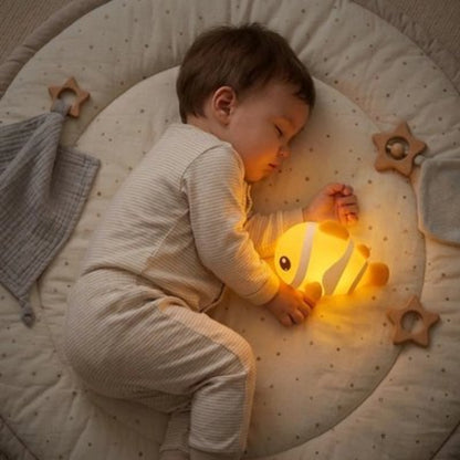 Veilleuse lumiere tamisee bebe dort pres de la veilleuse